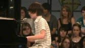 13 year old boy wows all the girls in a school show /Paparazzi's cover